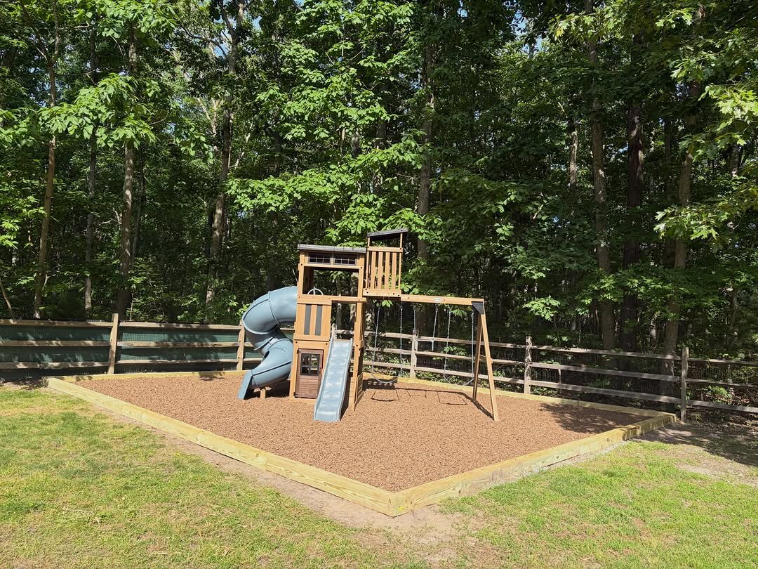 Playground and rubber mulch installation — safe, durable, and fun spaces where kids can play, explore, and make memories.